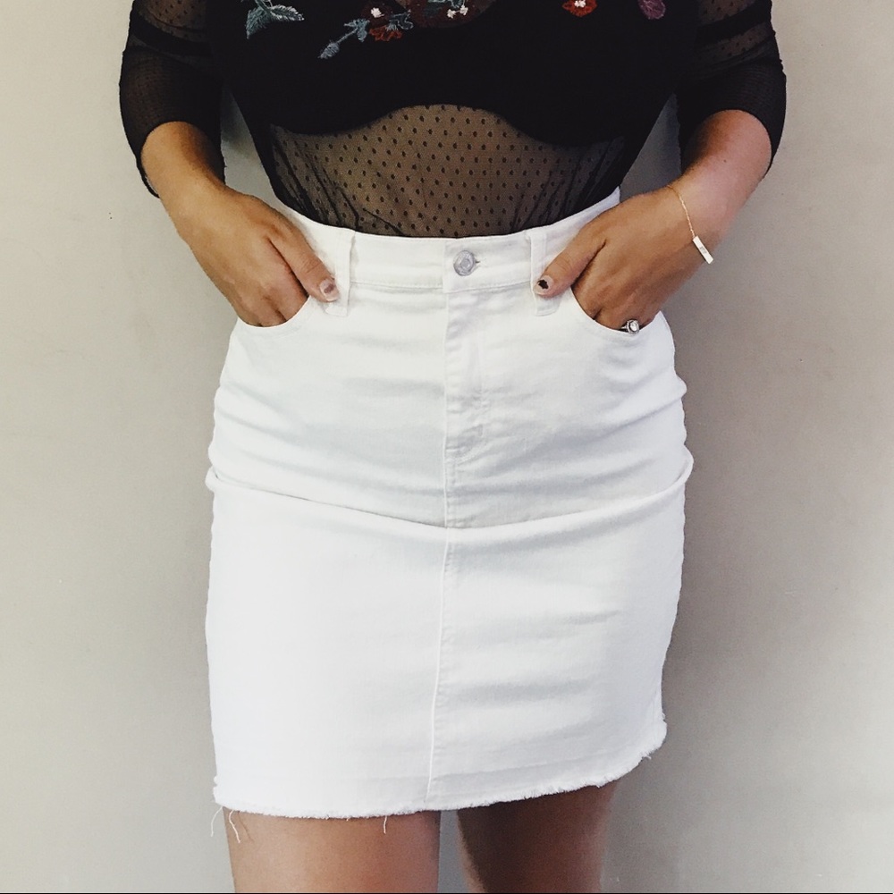 Mid length white skirt